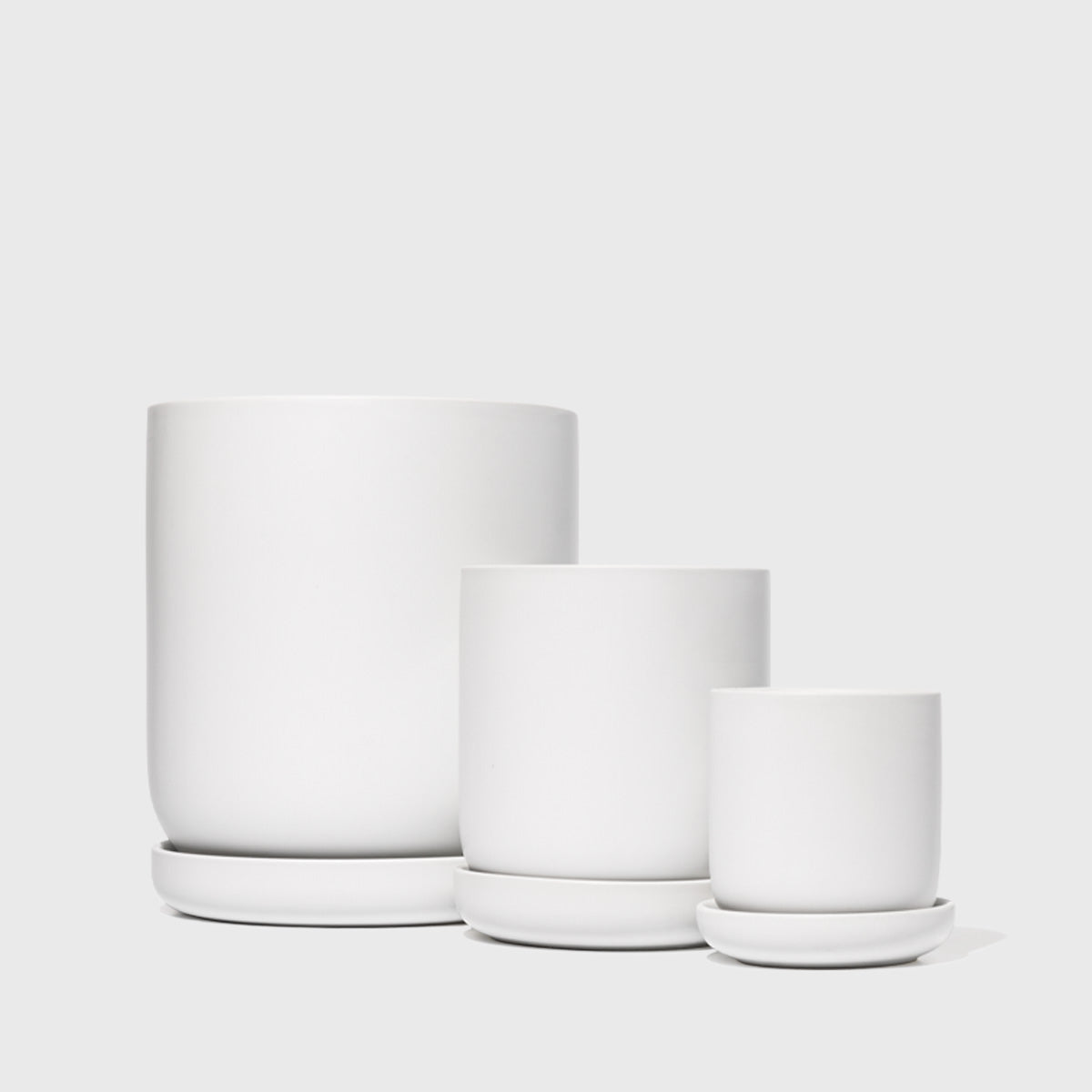 Assorted Stoneware Planters Public Goods