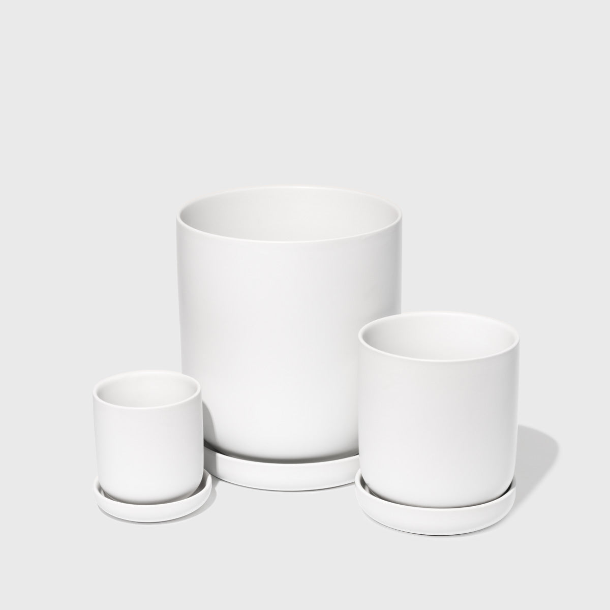 Assorted Stoneware Planters Public Goods