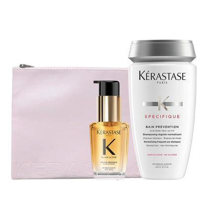 Set de rutina anticaída Kérastase con neceser plano rosa
