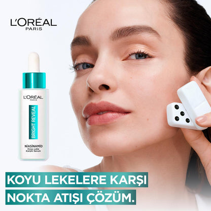 Sérum corrector de manchas oscuras con niacinamida Bright Reveal de L'Oréal Paris: atenúa marcas de acné, manchas solares y de la edad para una piel radiante